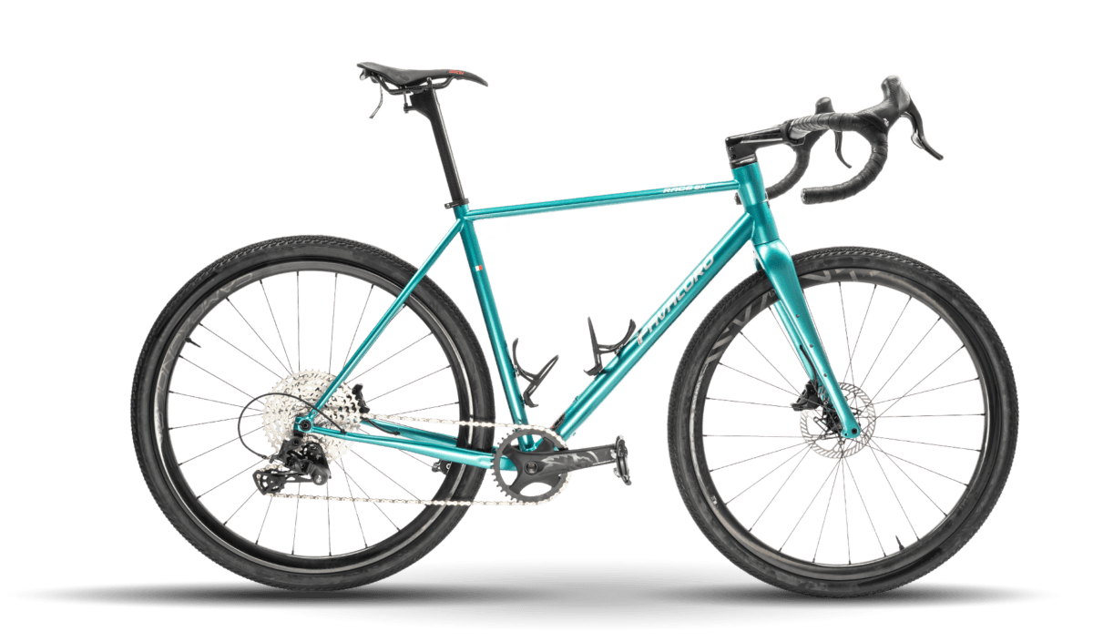 bici gravel modello race gx color turchese metallizzato con doppio porta borraccia sul tubo diagonale vista laterale